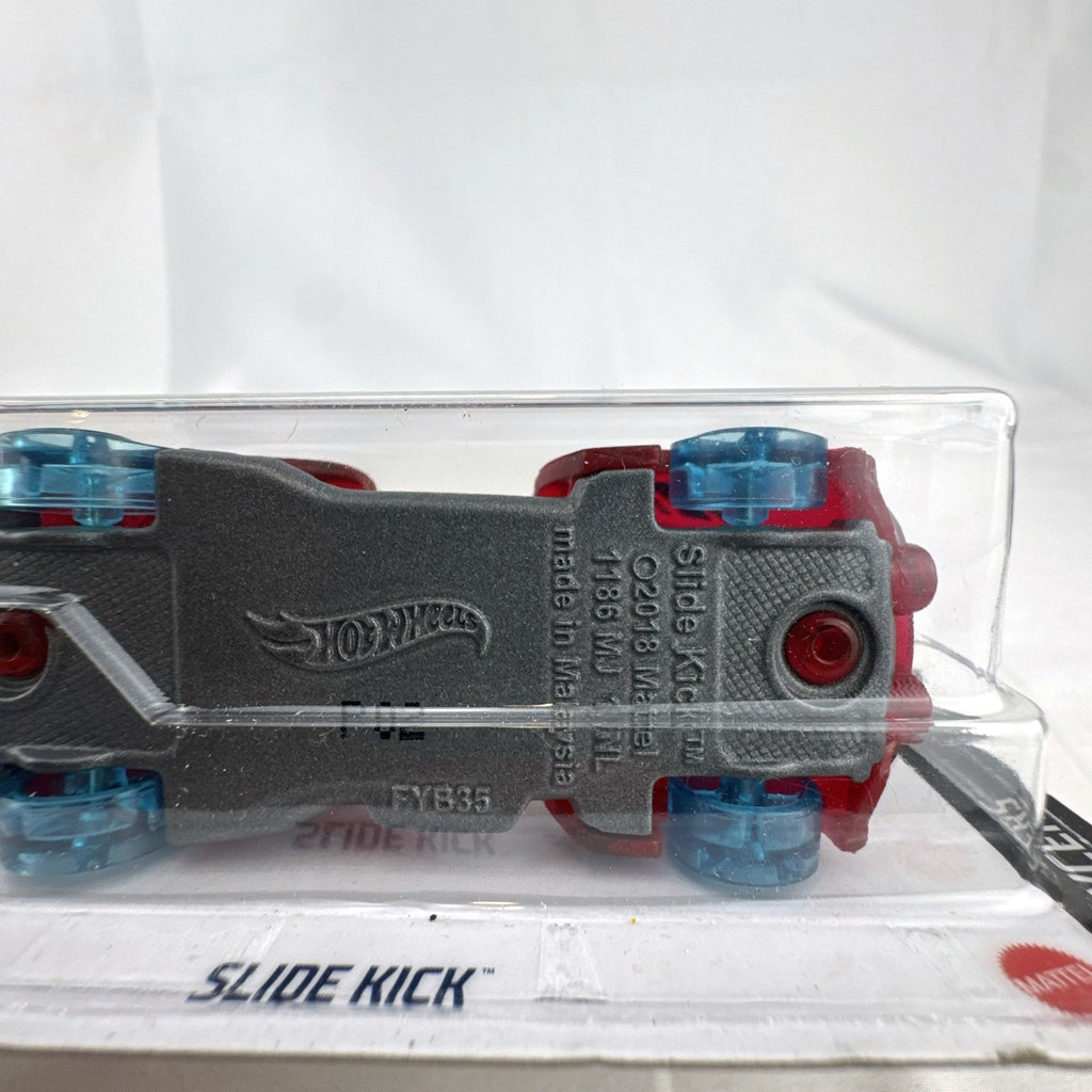 Sealed 2021 Hot Wheels Slide Kick 1:64 diecast car in translucent red from the X-Raycers series.
