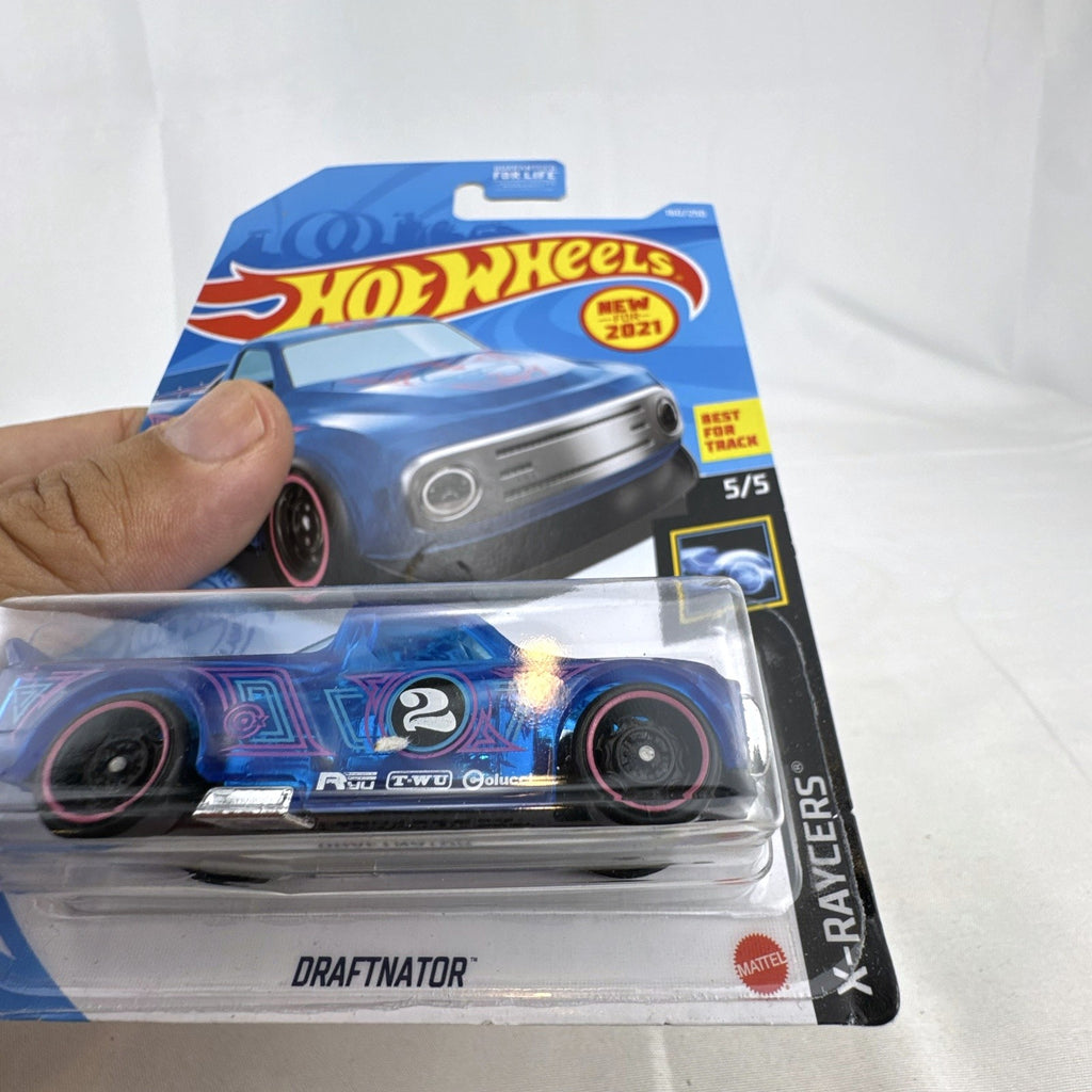 Hot Wheels 2021 Draftnator 1:64 diecast racing truck in translucent blue sealed on original packaging card