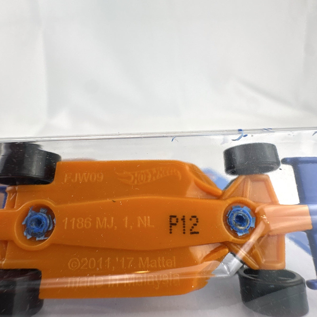 Hot Wheels 1:64 scale Indy 500 Oval race car in blue HW Race Team livery, factory sealed on original card package.
