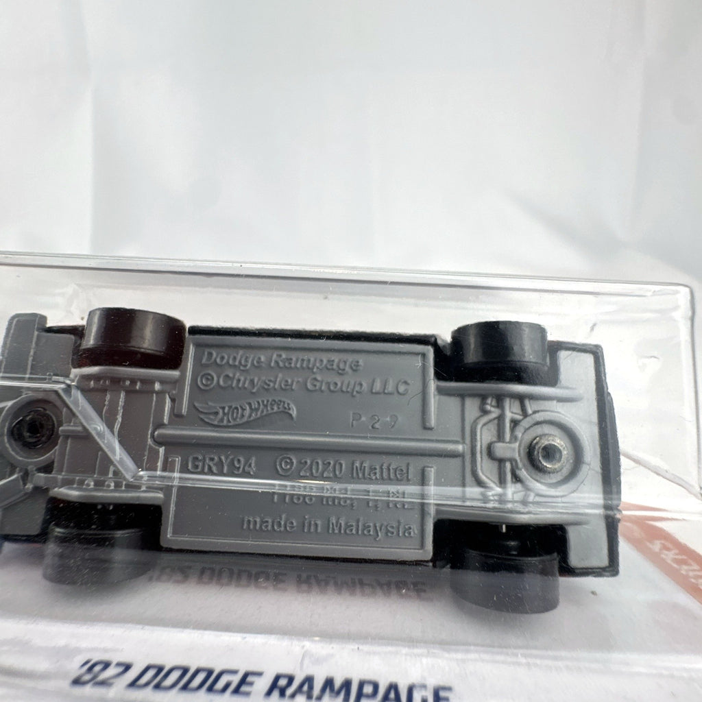 Hot Wheels 1982 Dodge Rampage 1:64 scale black diecast pickup truck in unopened blister pack