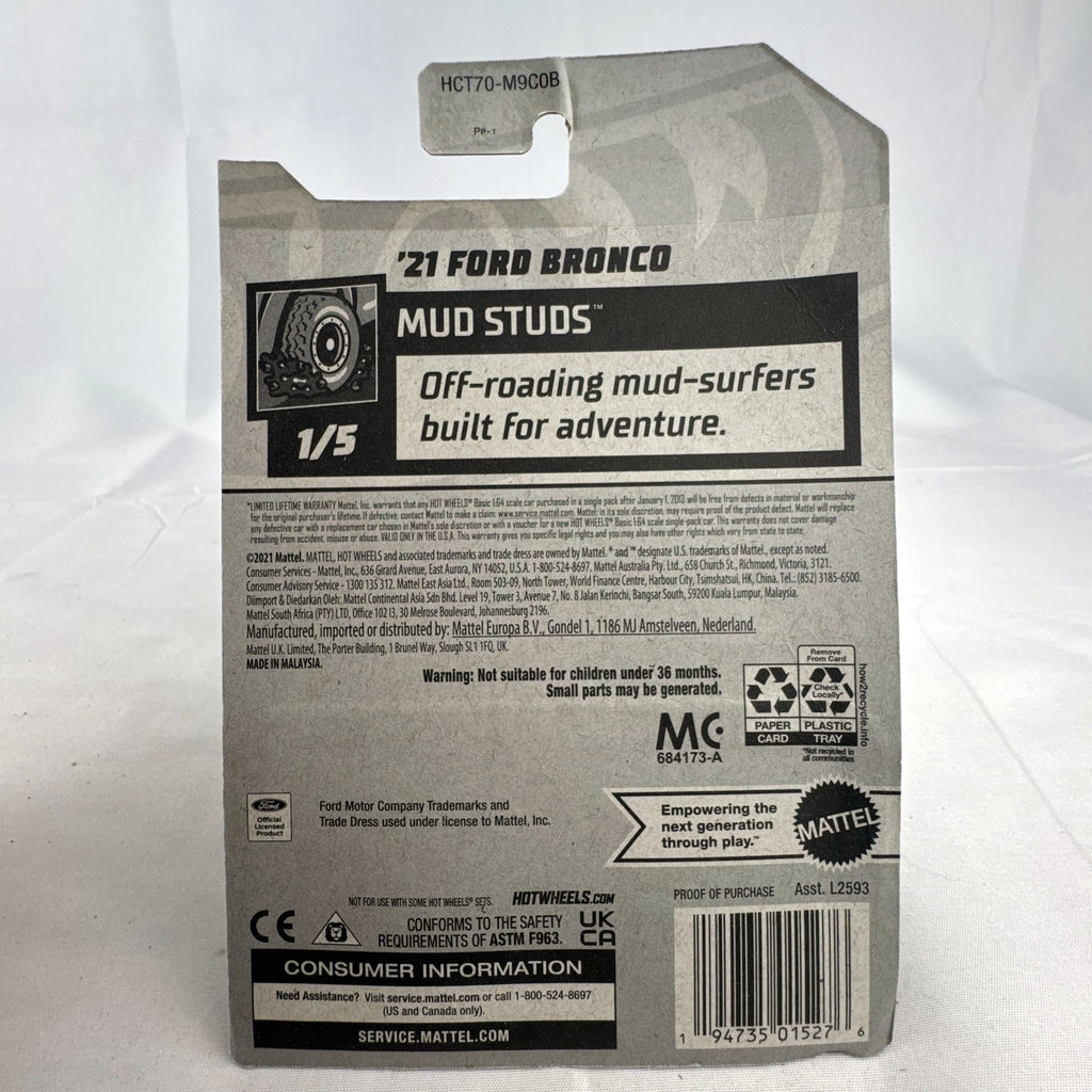 Hot Wheels 2021 Ford Bronco diecast SUV in gray with Mud Studs off-road graphics sealed on blister card
