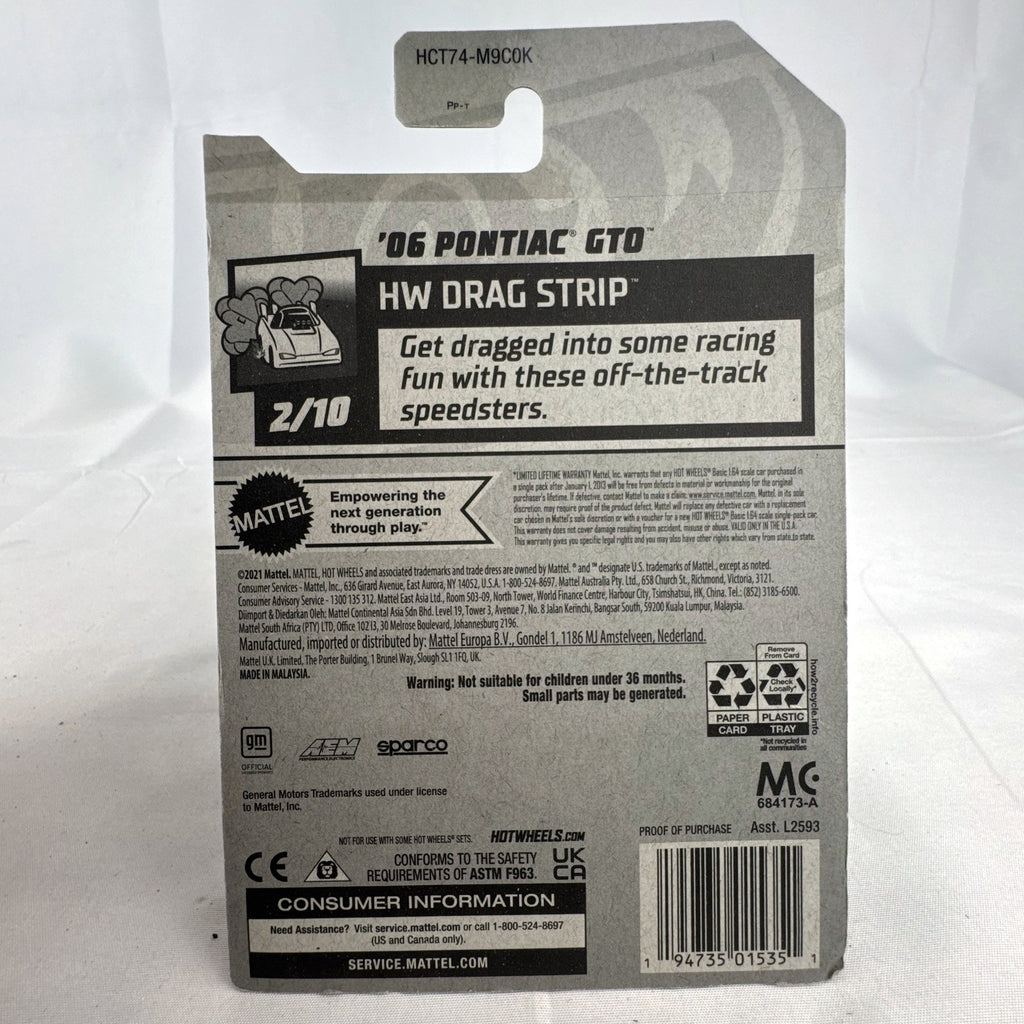 Hot Wheels 1:64 scale red '06 Pontiac GTO HW Drag Strip series diecast car in factory sealed blister package