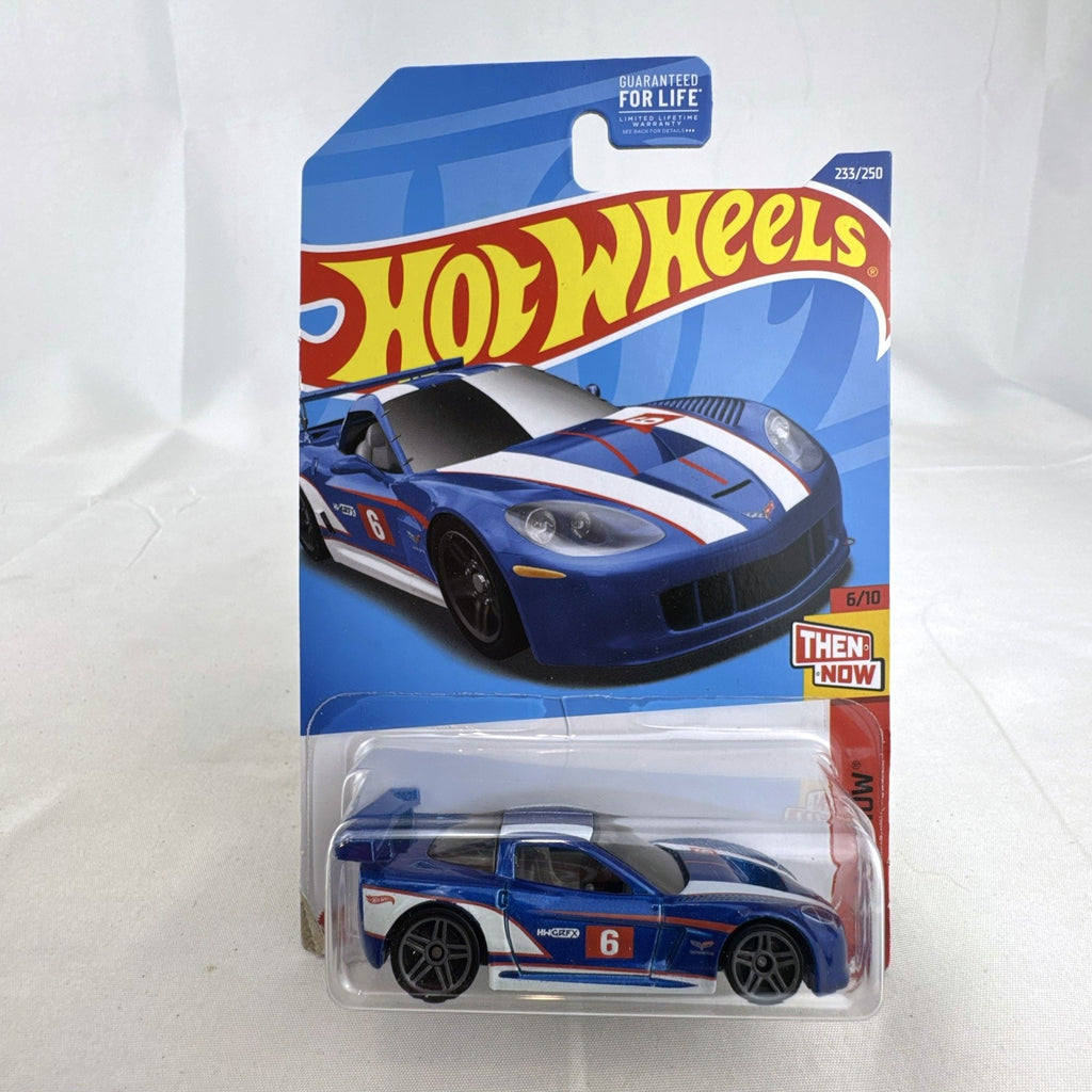 Hot Wheels 1:64 scale blue Chevrolet Corvette C6R diecast racing car sealed in original packaging.