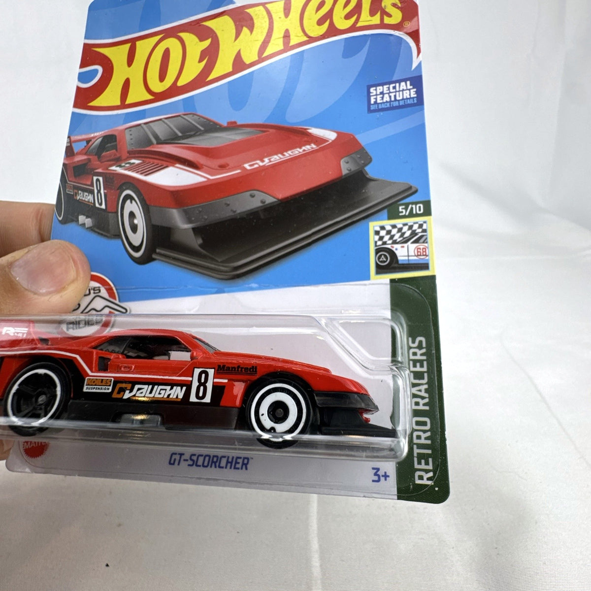 Hot Wheels GT-Scorcher 1:64 diecast race car in red, factory sealed in original 2022 packaging