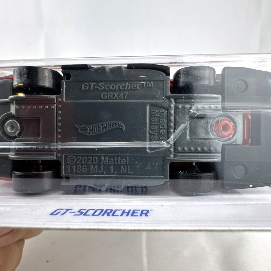 Hot Wheels GT-Scorcher 1:64 diecast race car in red, factory sealed in original 2022 packaging