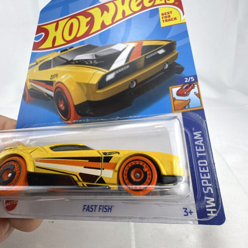 Hot Wheels 1:64 scale Fast Fish diecast muscle car in yellow sealed on original 2022 HW Speed Team card