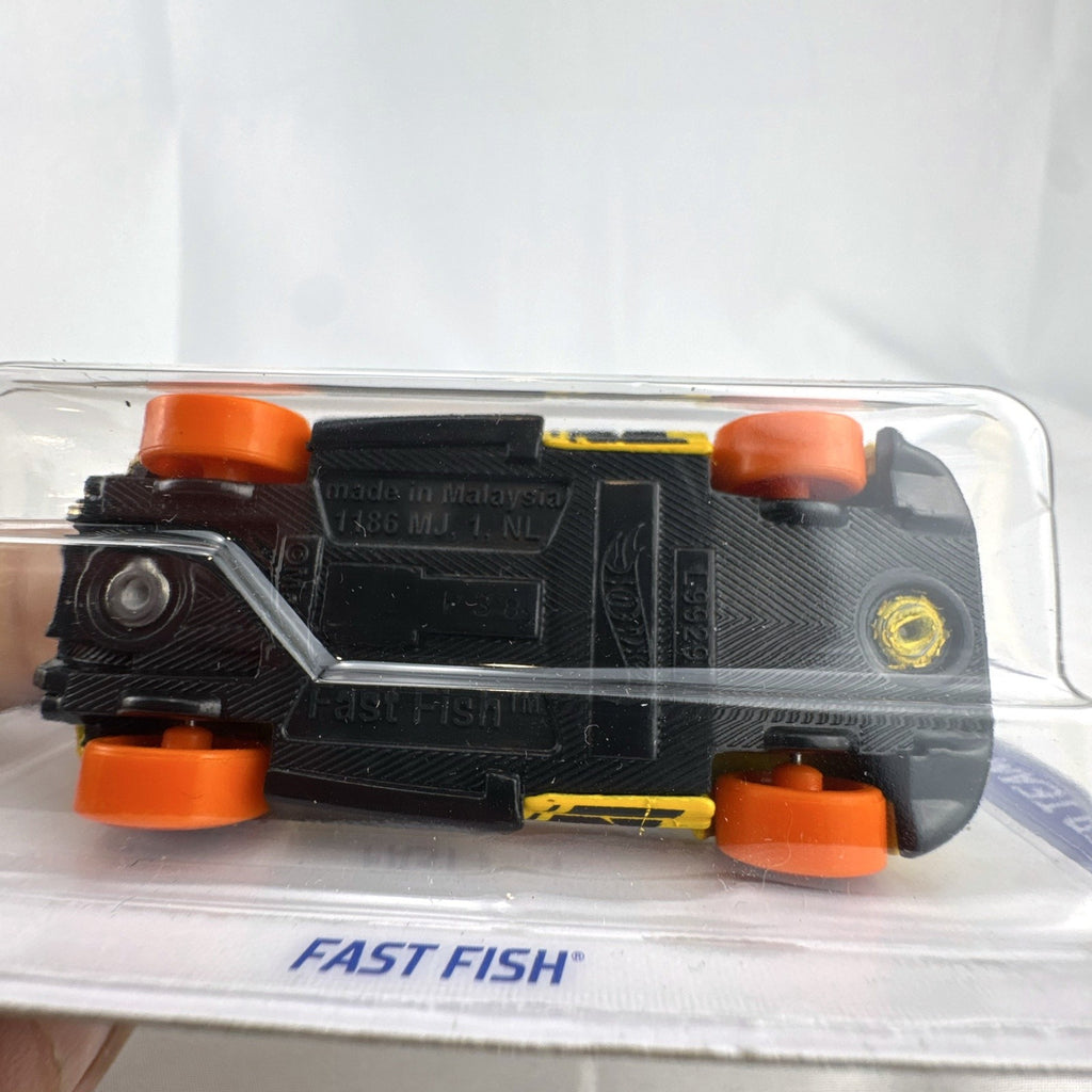 Hot Wheels 1:64 scale Fast Fish diecast muscle car in yellow sealed on original 2022 HW Speed Team card