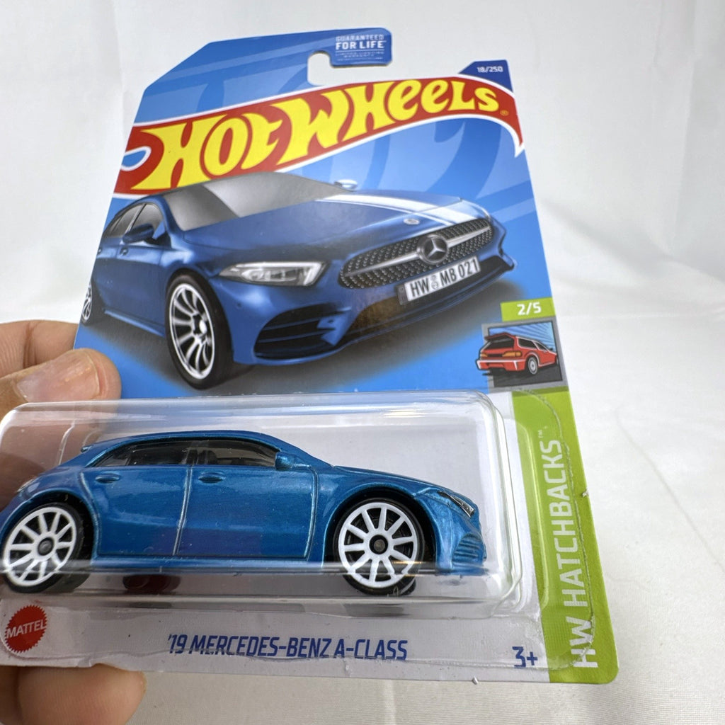 Hot Wheels 1:64 scale 2019 Mercedes-Benz A-Class diecast hatchback in metallic blue factory sealed on card.
