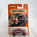 Red Matchbox Push 'N Puller 1:64 scale diecast truck with shark mouth graphics, sealed in original packaging.