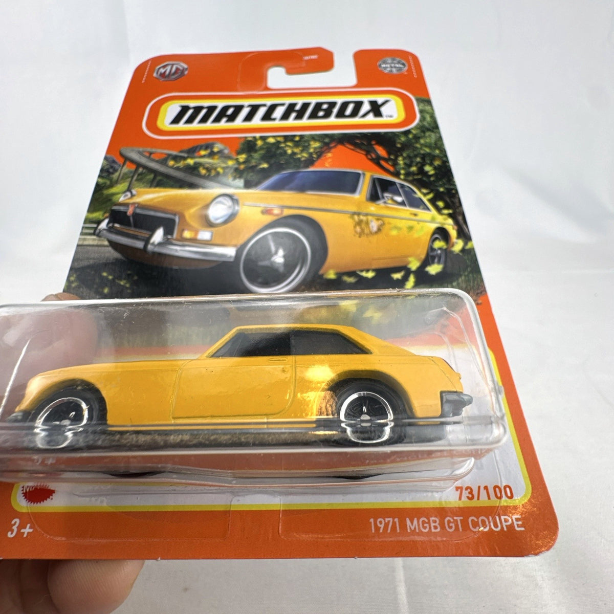 Yellow Matchbox 1:64 scale 1971 MGB GT Coupe diecast car sealed on original blister card.