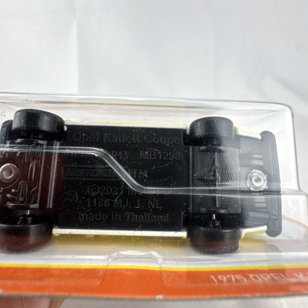 Matchbox 1:64 scale 1975 Opel Kadett C GT/E diecast car in white and yellow sealed on blister card