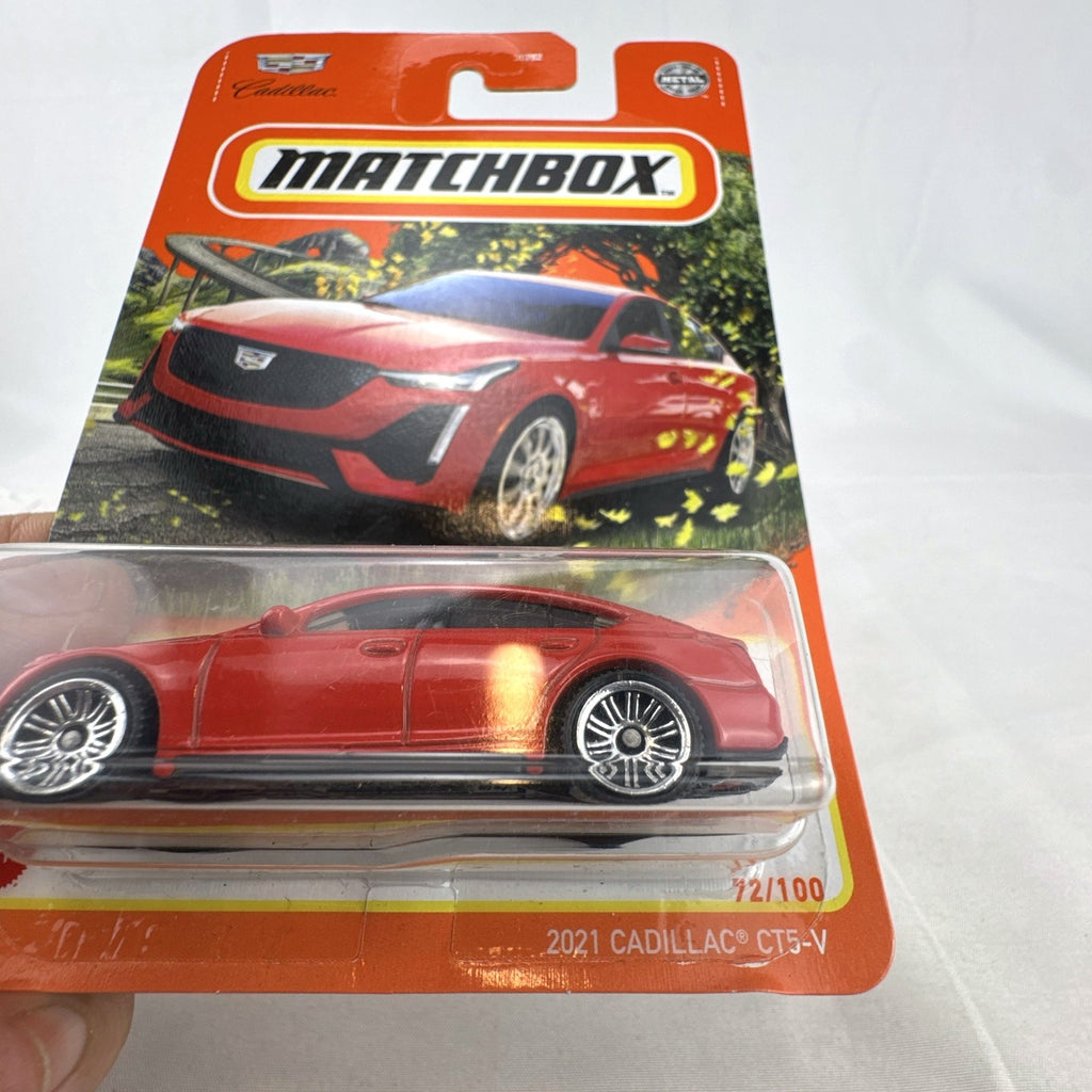 Sealed Matchbox 1:64 scale diecast 2021 Cadillac CT5-V Blackwing model car in bold red on original cardpack.