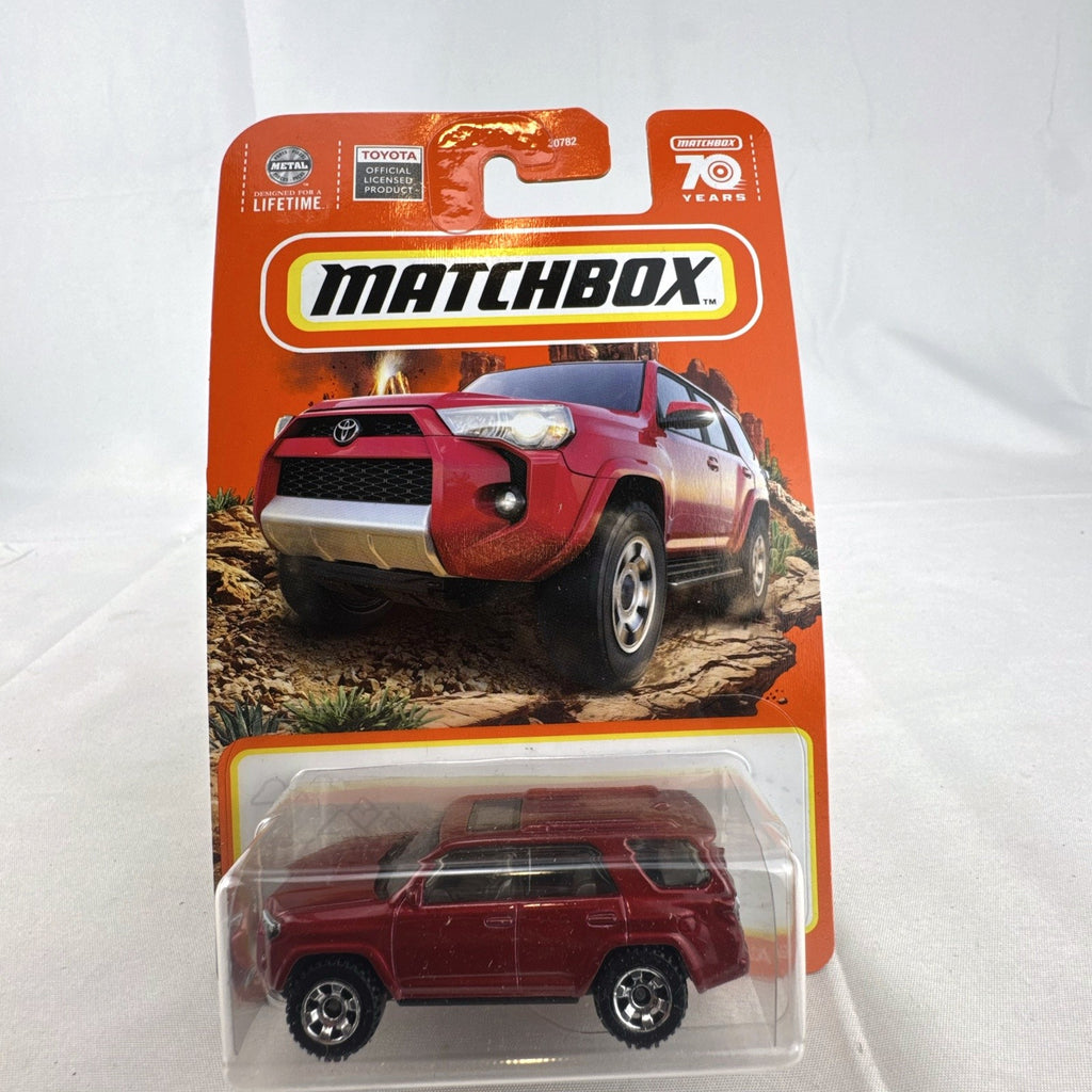 Matchbox 1:64 scale 2018 Toyota 4Runner diecast SUV in metallic red 70th Anniversary blister packaging