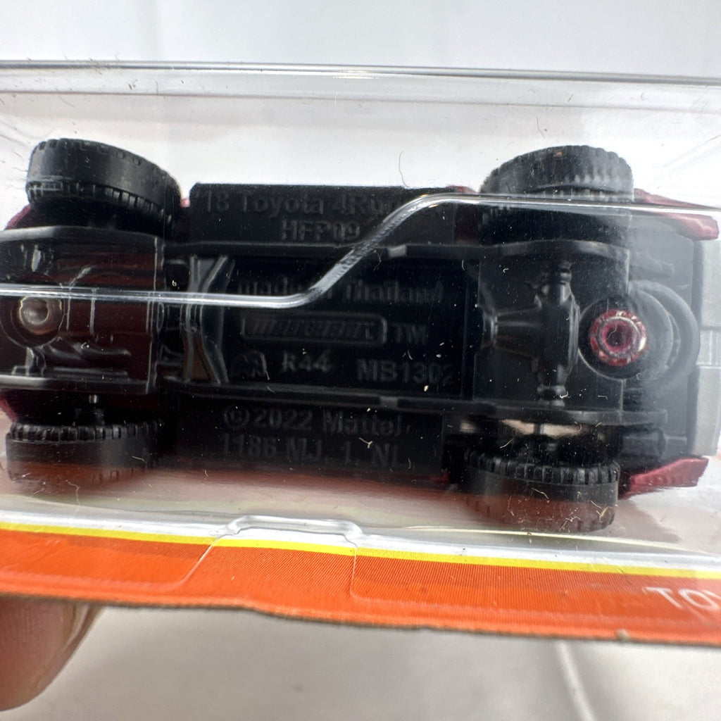 Matchbox 1:64 scale 2018 Toyota 4Runner diecast SUV in metallic red 70th Anniversary blister packaging