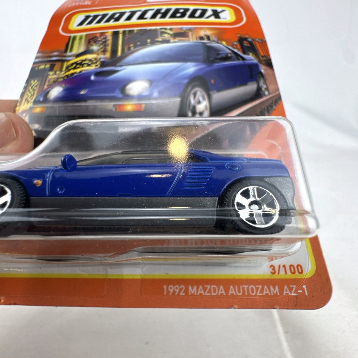 Matchbox 1:64 scale 1992 Mazda Autozam AZ-1 diecast model car in blue, 70th Anniversary series.