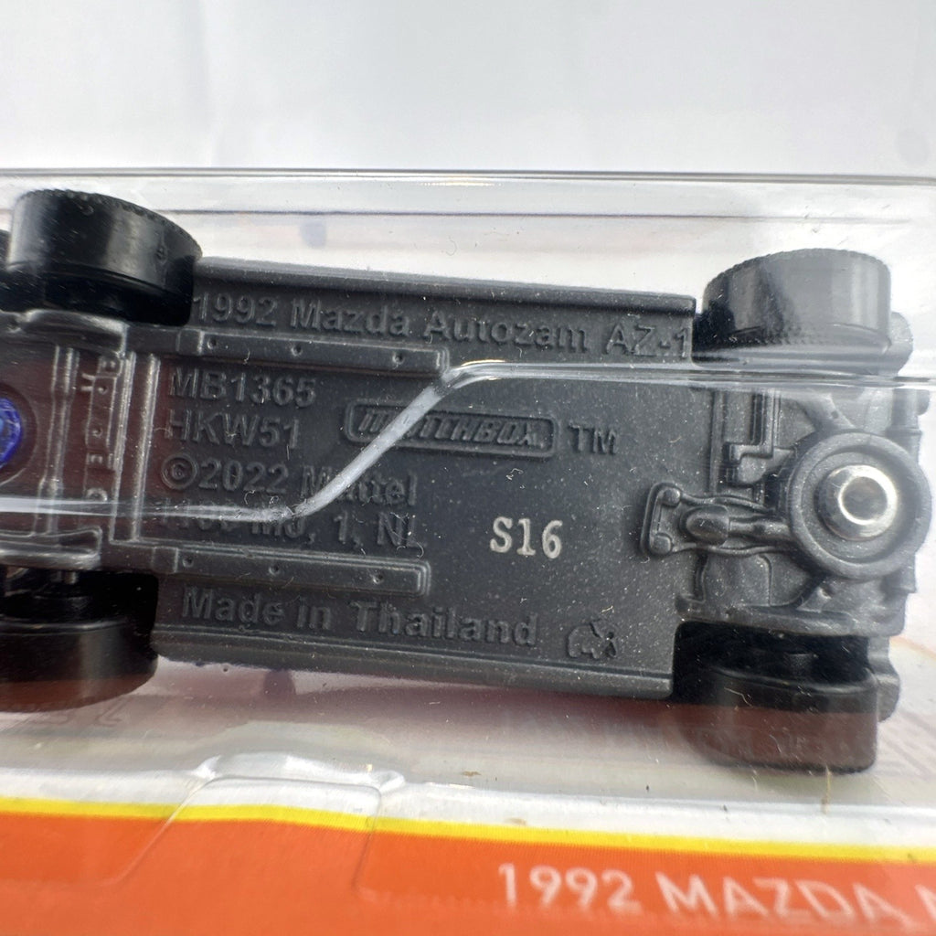 Matchbox 1:64 scale 1992 Mazda Autozam AZ-1 diecast model car in blue, 70th Anniversary series.