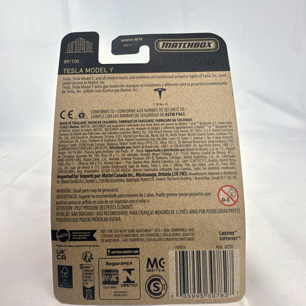 Sealed Matchbox 1:64 scale Tesla Model Y diecast car in white from the 70th Anniversary collection number 89/100