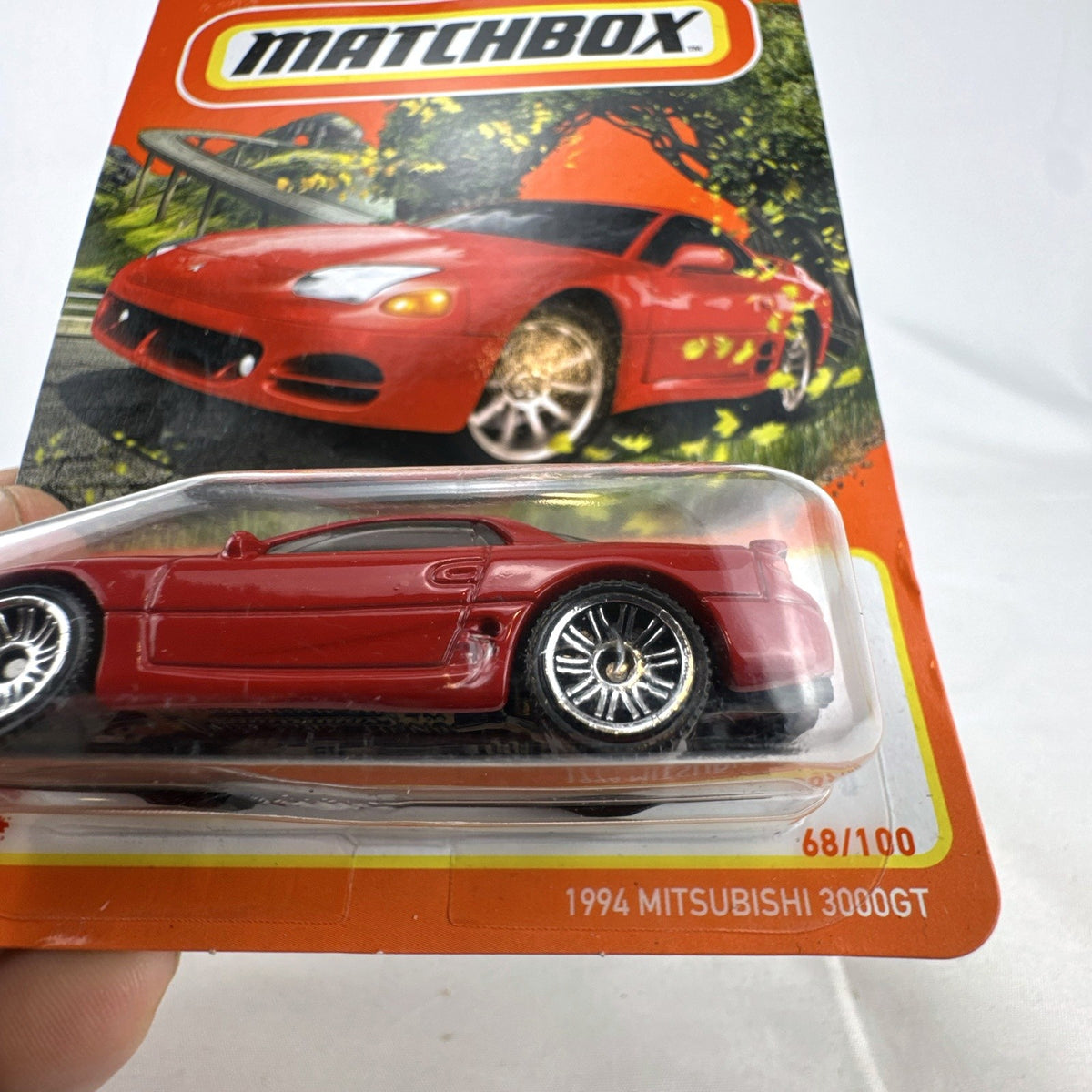 Matchbox 1:64 scale 1994 Mitsubishi 3000GT diecast car in factory red, 70th Anniversary packaging.