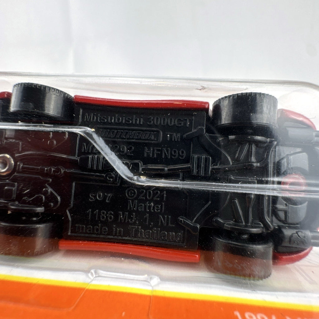 Matchbox 1:64 scale 1994 Mitsubishi 3000GT diecast car in factory red, 70th Anniversary packaging.
