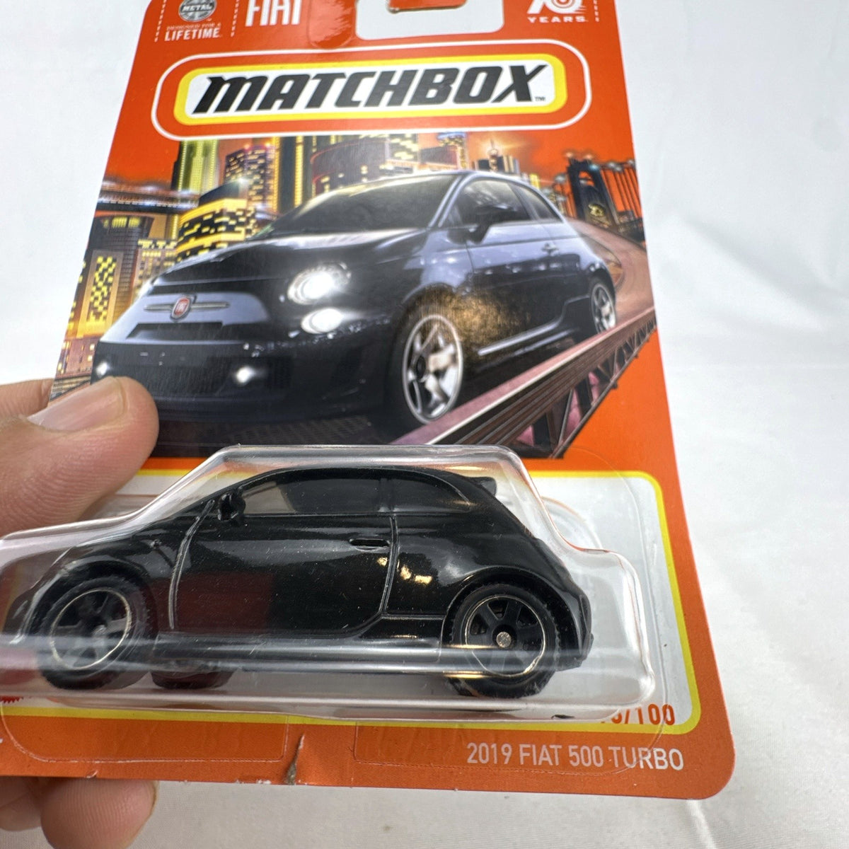 Matchbox 70th Anniversary 2019 Fiat 500 Turbo 1:64 scale diecast car in gloss black on original unopened card.