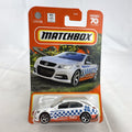 Matchbox 1:64 scale Holden VF Commodore SSV Police Highway Patrol diecast car in white 70th Anniversary packaging