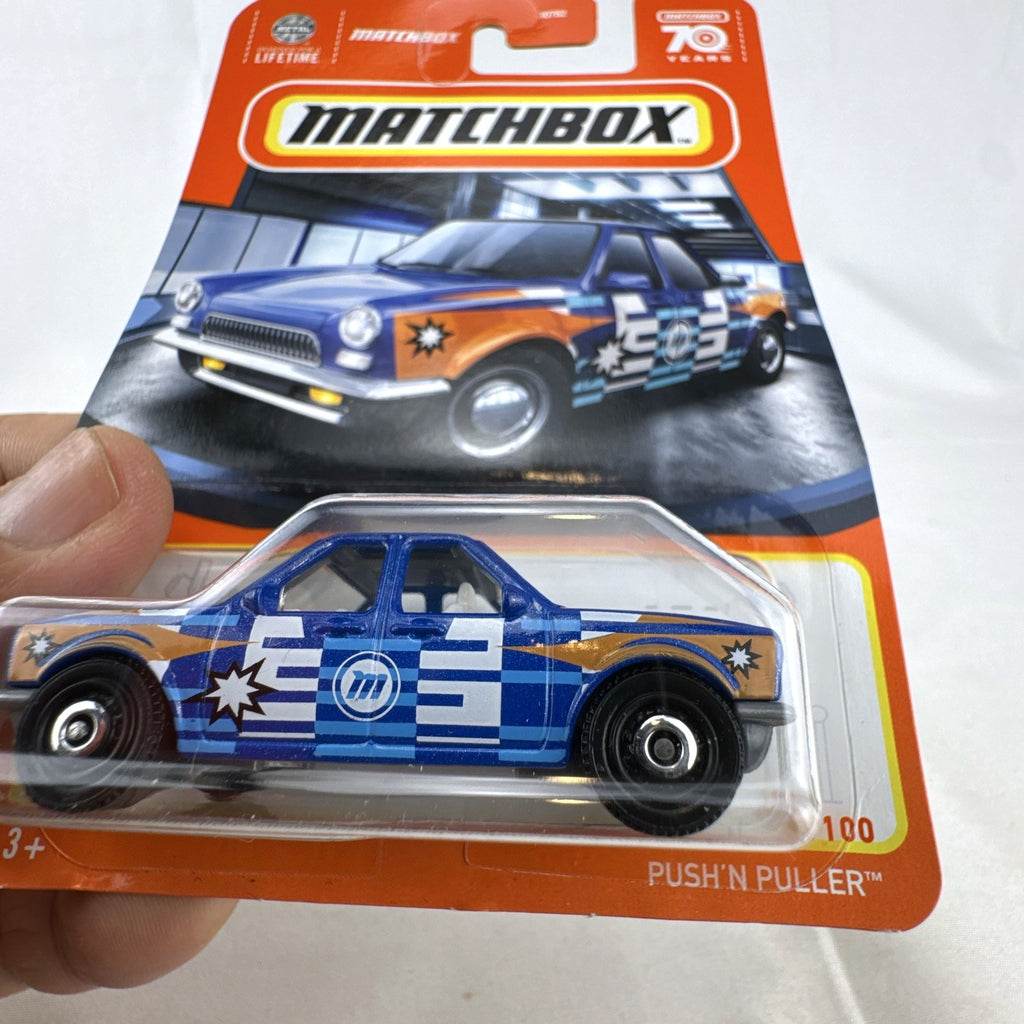 Matchbox 70th Anniversary Push'n Puller 1:64 scale blue diecast pickup truck in unopened blister pack.