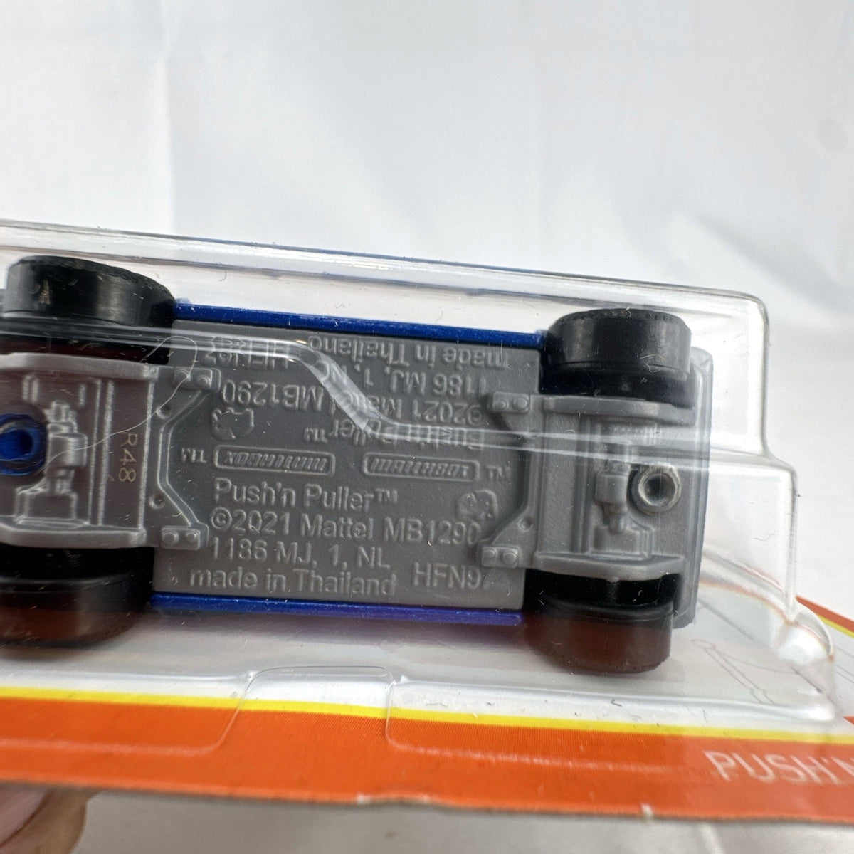 Matchbox 70th Anniversary Push'n Puller 1:64 scale blue diecast pickup truck in unopened blister pack.