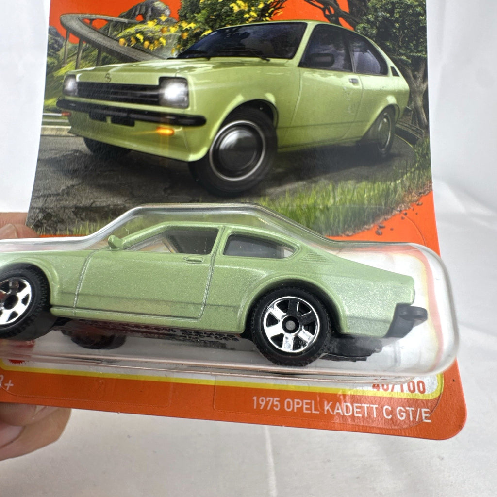 Matchbox 1:64 scale 1975 Opel Kadett C GT/E diecast car in metallic light green, sealed on blister card