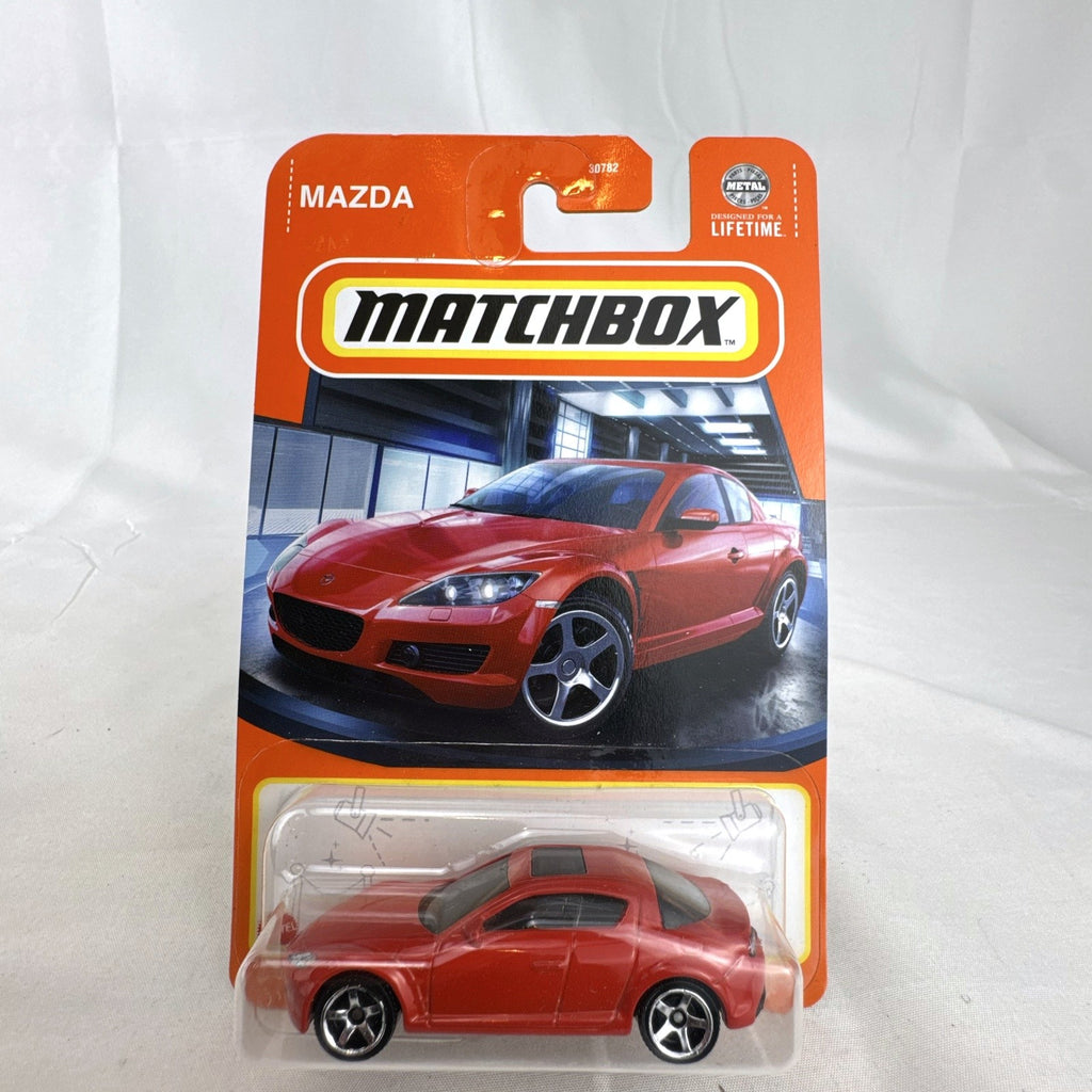 Matchbox 1:64 scale diecast 2004 Mazda RX-8 coupe in red inside factory sealed blister card package