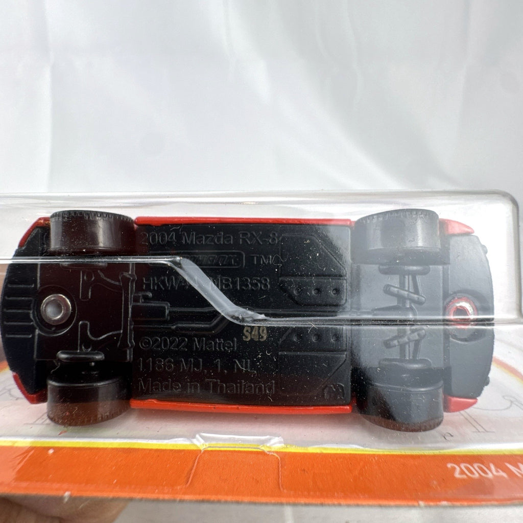 Matchbox 1:64 scale diecast 2004 Mazda RX-8 coupe in red inside factory sealed blister card package