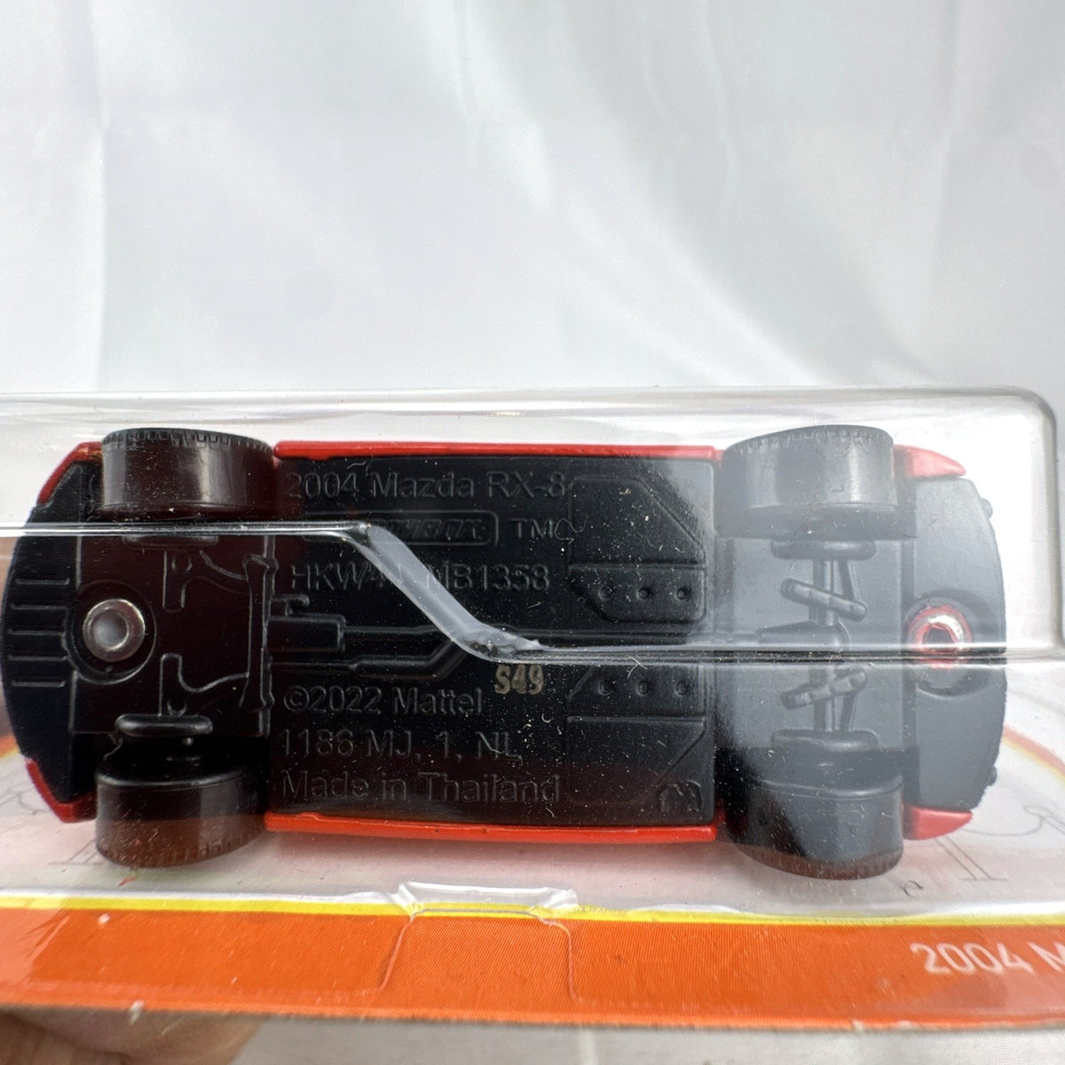 Matchbox 1:64 scale diecast 2004 Mazda RX-8 coupe in red inside factory sealed blister card package