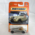 Matchbox 2024 Morgan Plus Four 1:64 scale metallic silver diecast car in factory sealed original card packaging.