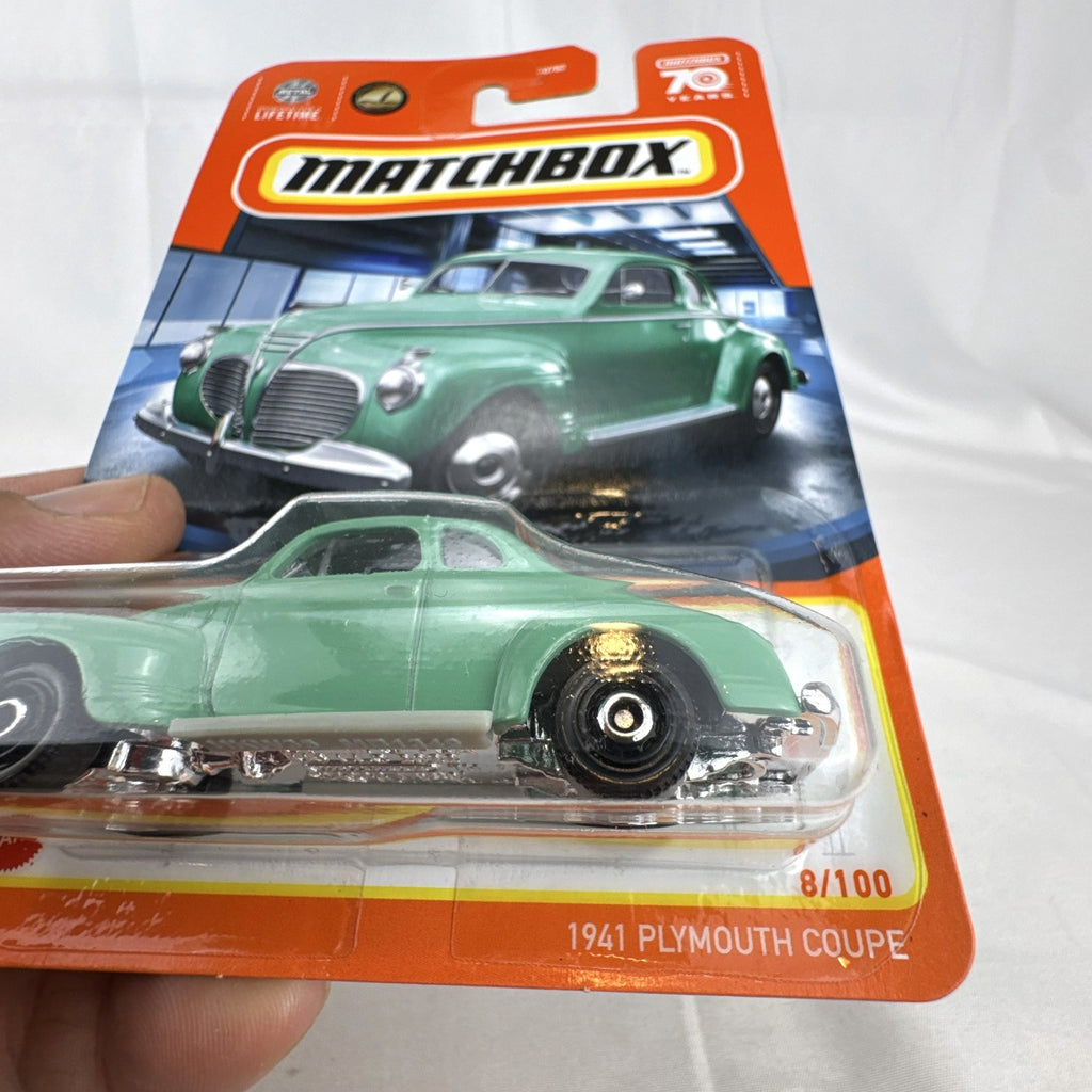 Matchbox 1:64 scale 1941 Plymouth Coupe in light green from the 70th Anniversary collection, factory sealed on original card.