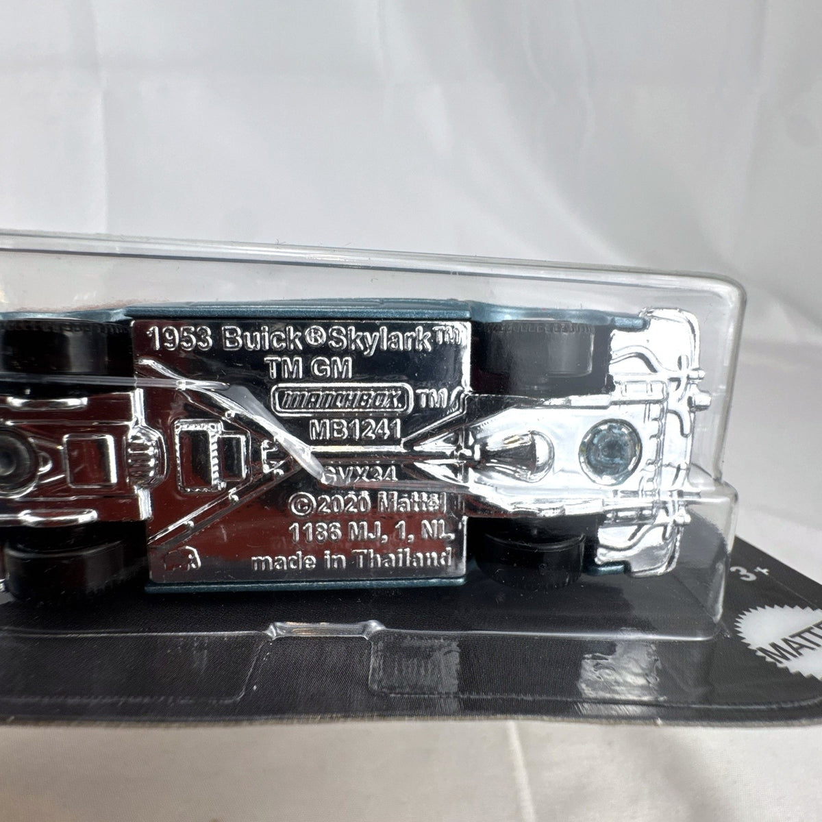 Sealed Matchbox 1:64 scale 1953 Buick Skylark Convertible diecast car in metallic light blue