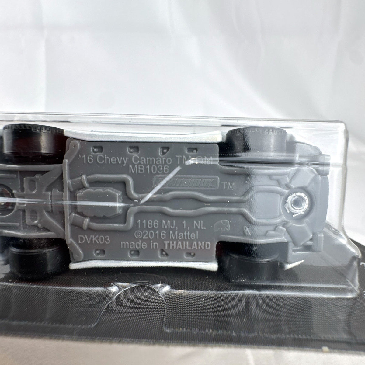 Matchbox 2016 Chevrolet Camaro Convertible 1:64 diecast car in white, sealed in original packaging.
