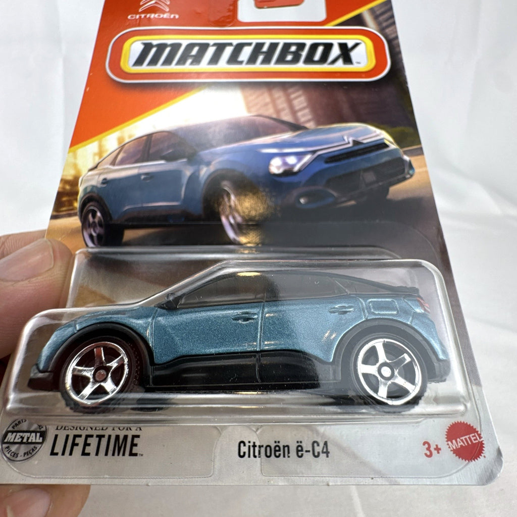 Matchbox 1:64 scale 2023 Citroën ë-C4 diecast car in metallic blue, factory sealed on original card