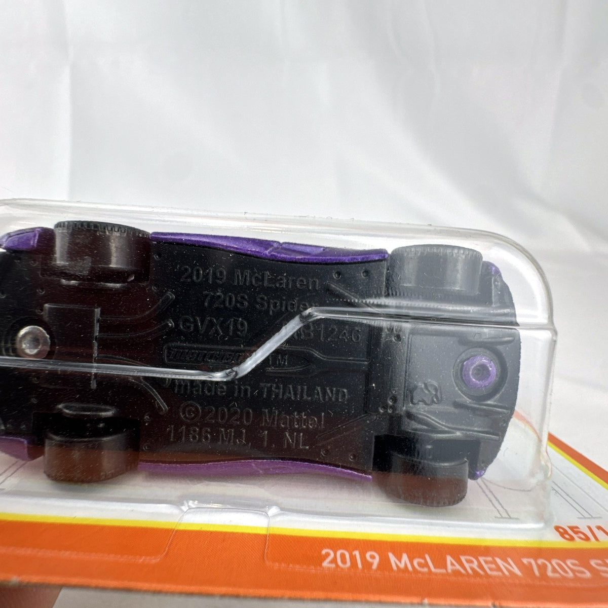 Matchbox 1:64 scale 2019 McLaren 720S Spider convertible diecast car in metallic purple, factory sealed on blister card.