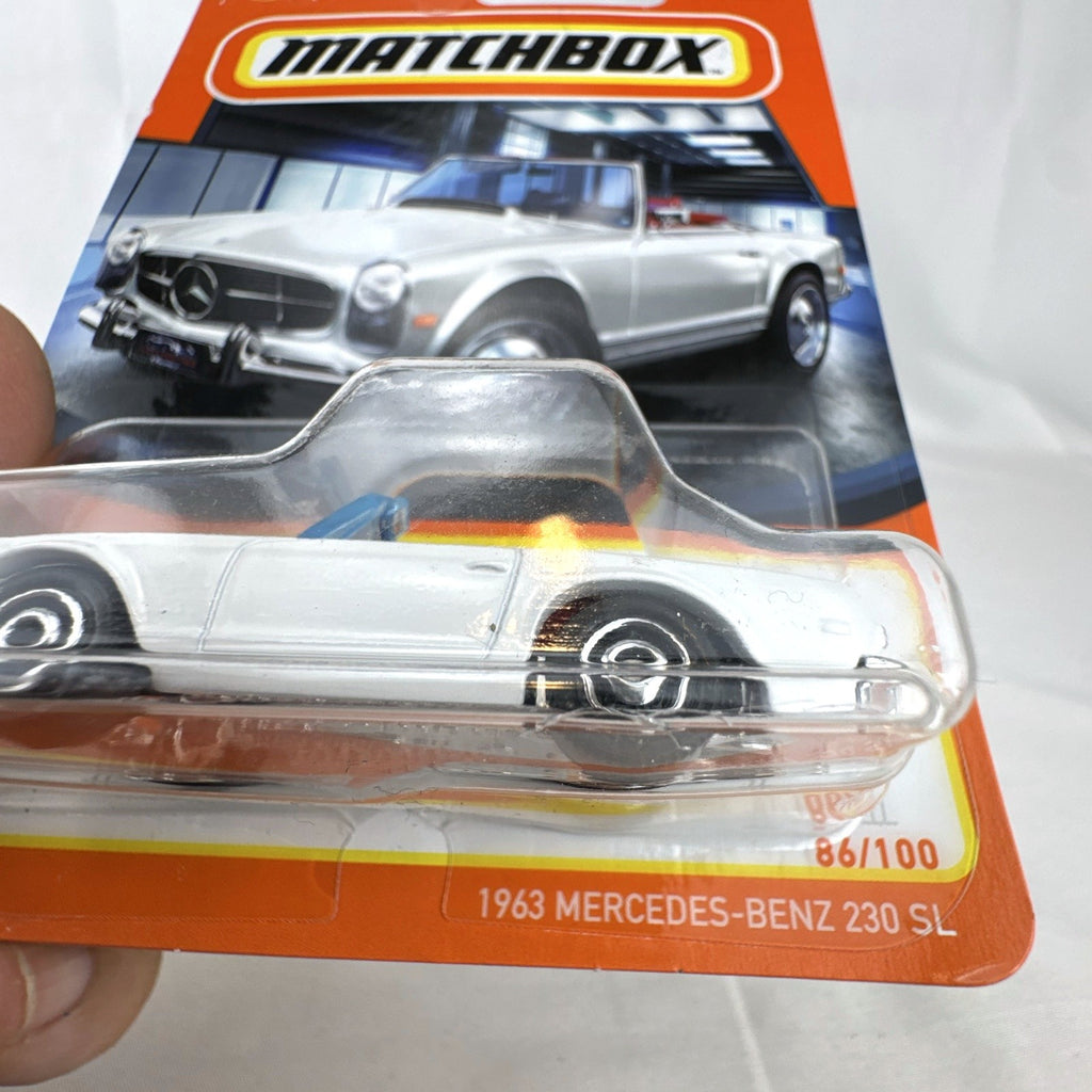 Sealed 2024 Matchbox 1:64 scale 1963 Mercedes-Benz 230 SL diecast model car in white with red interior
