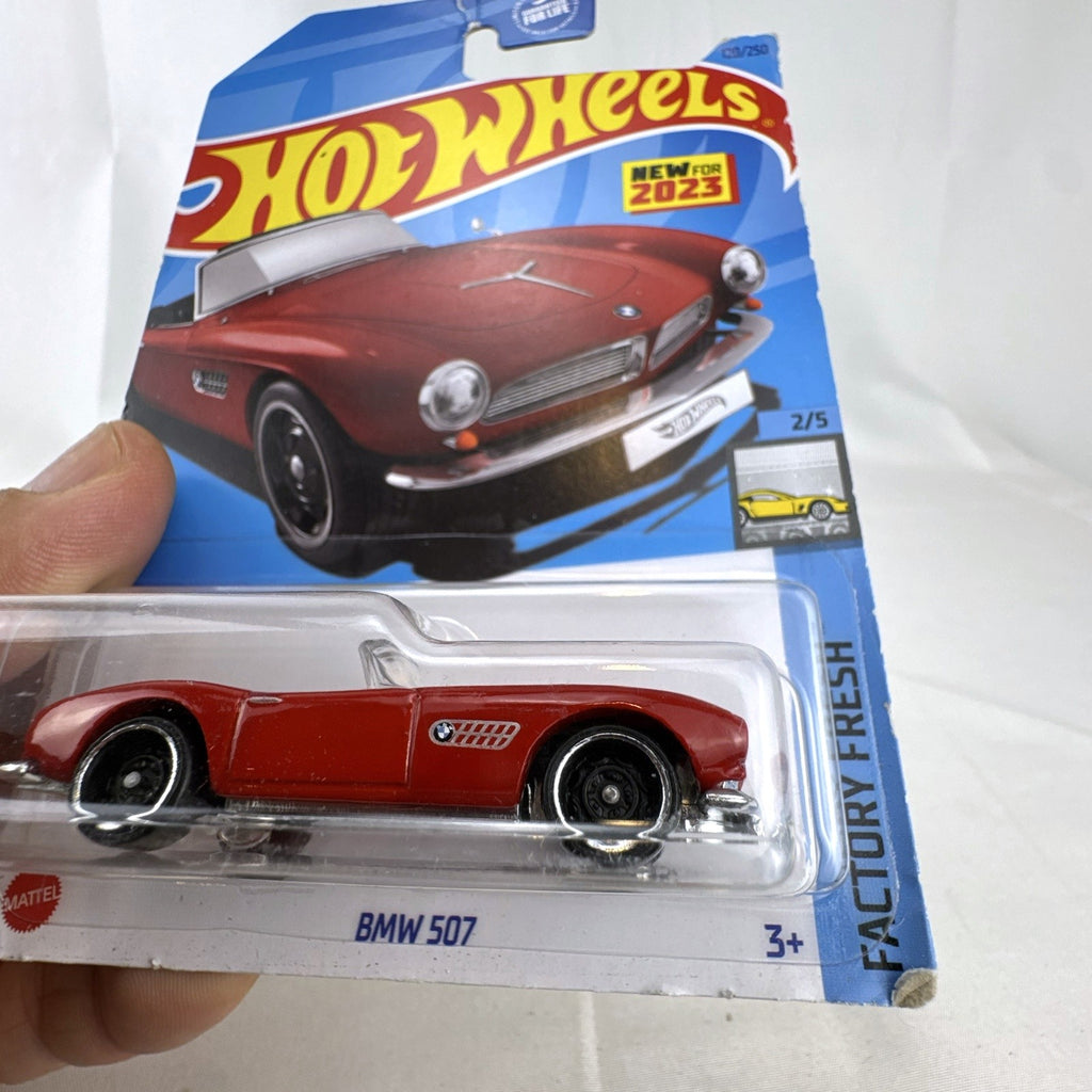 Hot Wheels 1:64 scale 1956 BMW 507 Roadster diecast car in factory red, sealed on card.