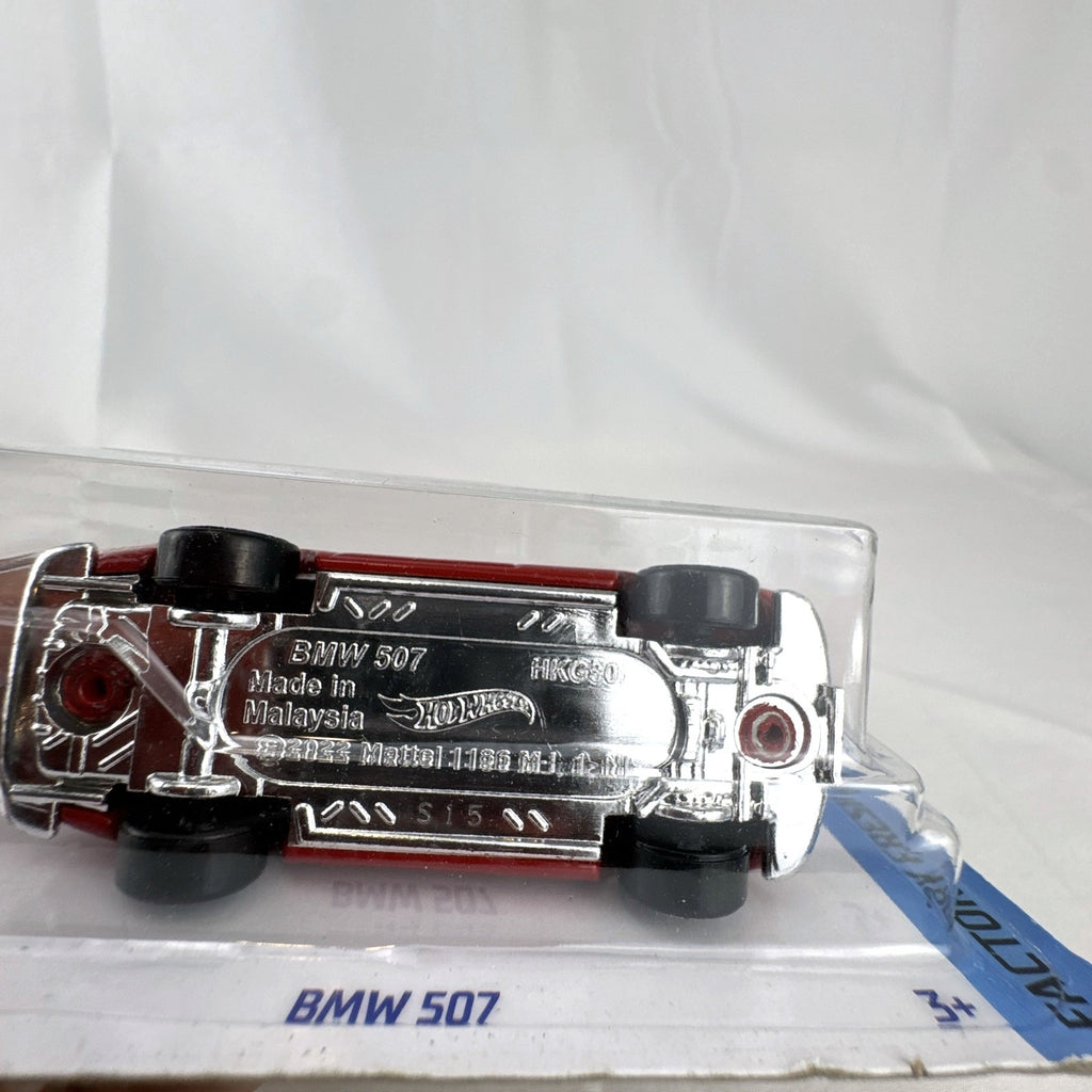Hot Wheels 1:64 scale 1956 BMW 507 Roadster diecast car in factory red, sealed on card.