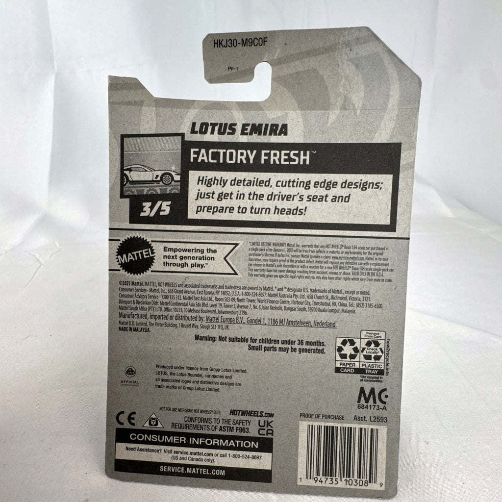 Hot Wheels Factory Fresh 1:64 scale Lotus Emira diecast car in metallic red sealed in original blister pack.