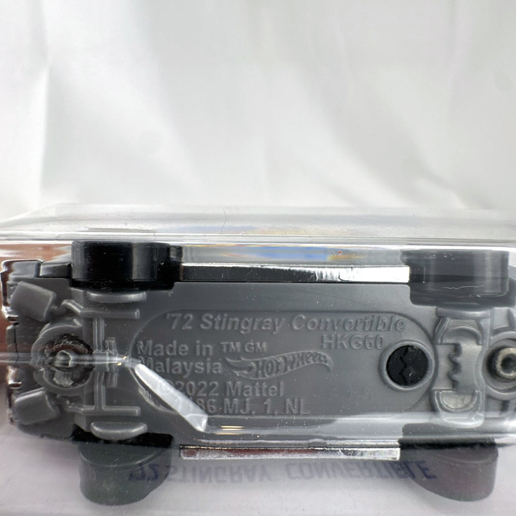 Hot Wheels 1972 Chevrolet Corvette Stingray Convertible 1:64 scale diecast car in metallic silver packaged on card.