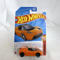 Sealed Hot Wheels 1:64 scale 2008 Tesla Roadster diecast car in vibrant orange on original blister card.
