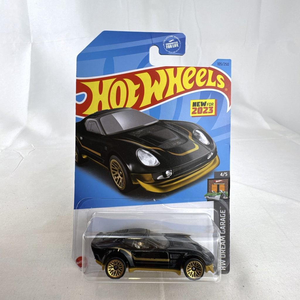 Hot Wheels 1:64 scale 2023 El Segundo Coupe diecast car in black with gold accents, factory sealed on card.