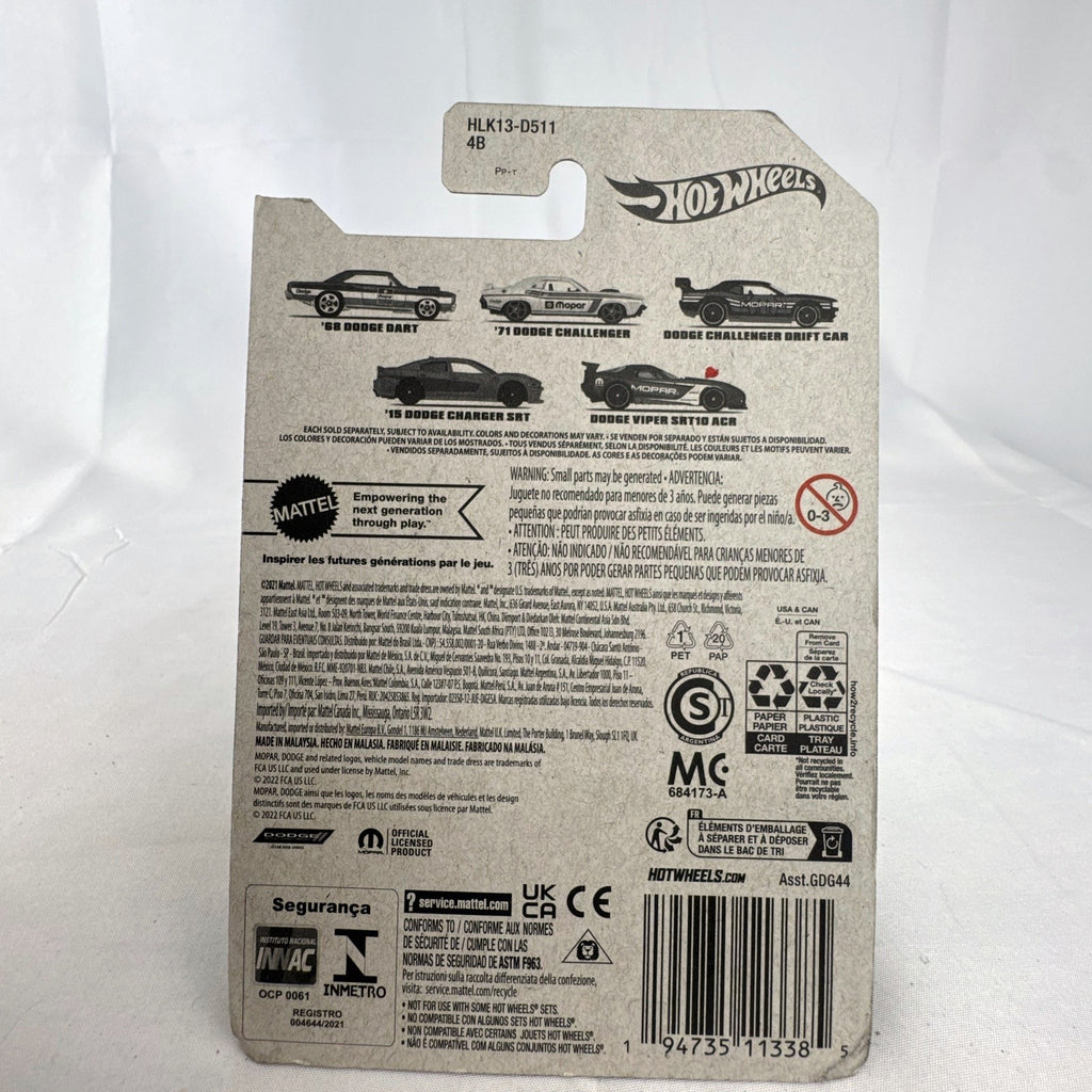 Sealed Hot Wheels 1:64 Dodge Challenger Drift Car in dark blue Mopar livery on original backing card.
