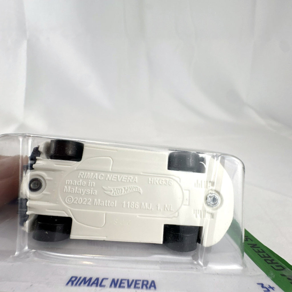 Sealed 2023 Hot Wheels 1:64 scale diecast Rimac Nevera car in white on original blister card.