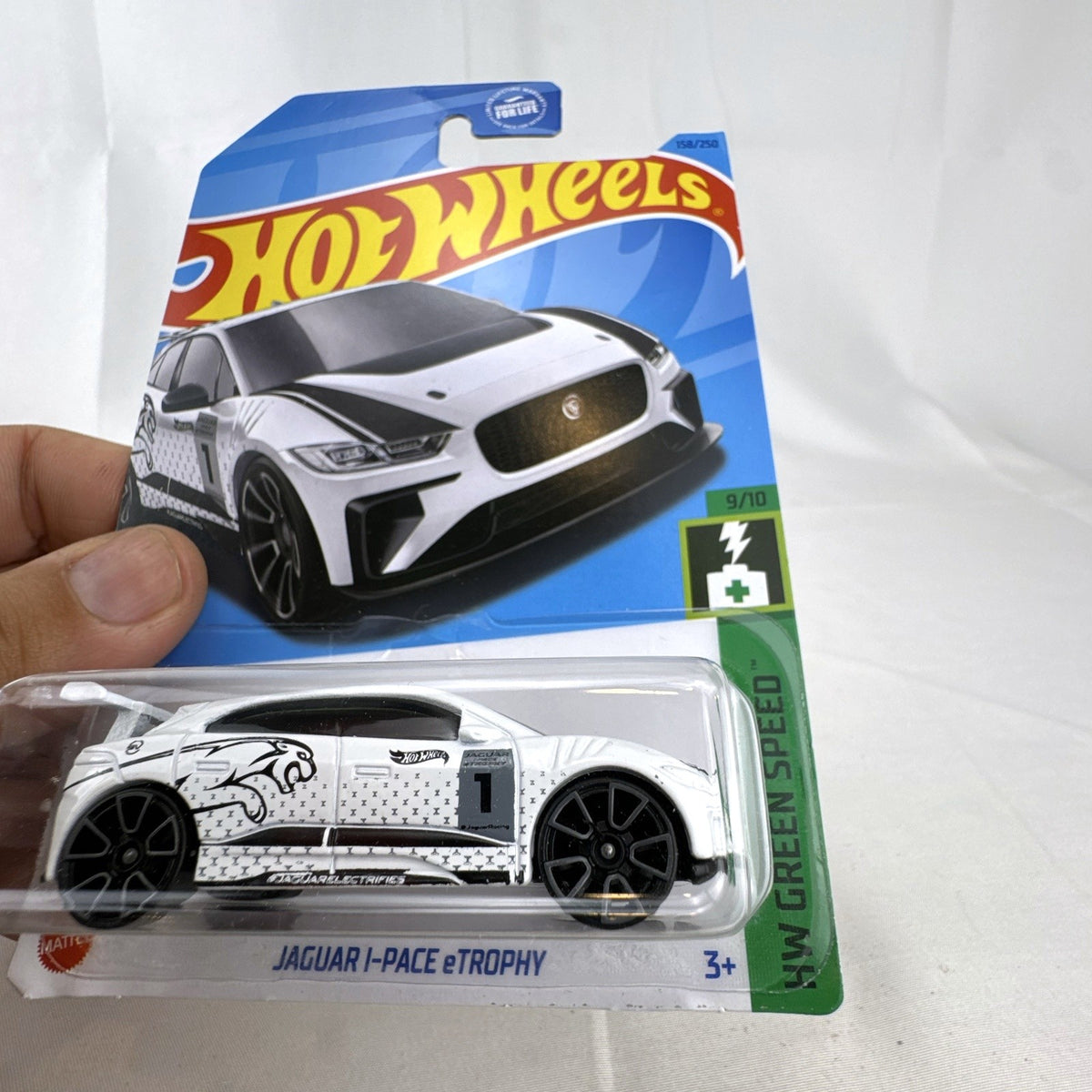 Hot Wheels 1:64 scale Jaguar I-Pace eTrophy diecast race car in white sealed on original blister card