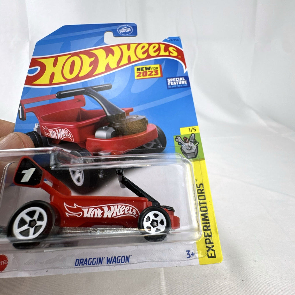 Hot Wheels 2023 Draggin' Wagon red 1:64 scale diecast car sealed in original Experimotors card packaging