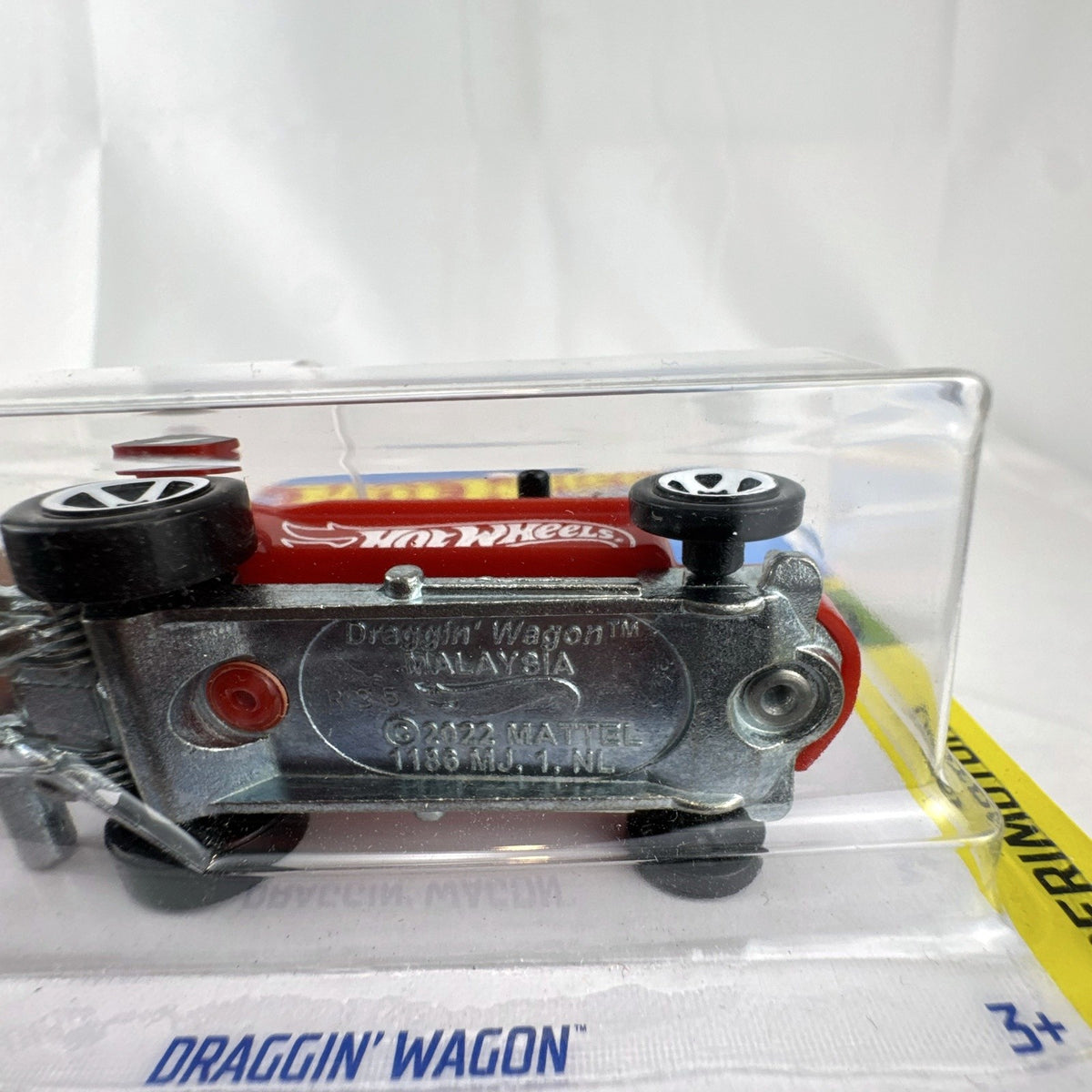 Hot Wheels 2023 Draggin' Wagon red 1:64 scale diecast car sealed in original Experimotors card packaging