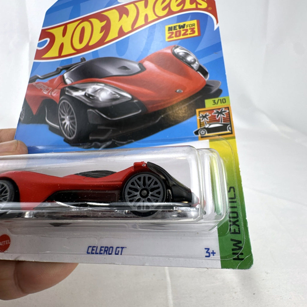 Sealed red Hot Wheels Celero GT 1:64 diecast car on original 2023 HW Exotics cardback